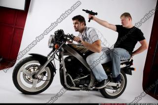 bikers-riding-shooting-uzi