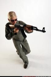 Woman Adult Athletic White Fighting with submachine gun Crouching Army