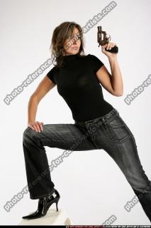 woman-standingonchair-revolver