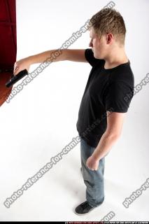 JANISONE-THREATEN-PISTOL