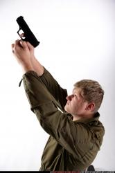 Man Young Average White Fighting with gun Kneeling poses Army