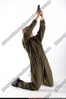 JANISONE KNEELING SHOOTING UP PISTOL 01 A.jpg