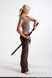 Woman Young Athletic White Fighting with sword Standing poses Sportswear