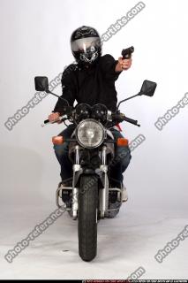 biker-shooting-front-pistol
