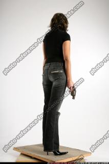 woman-standing-katana-pistol