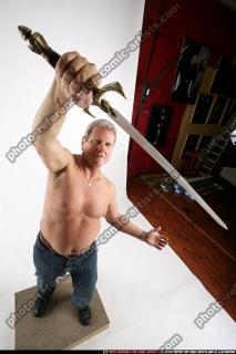 old-barbarian-defending-sword