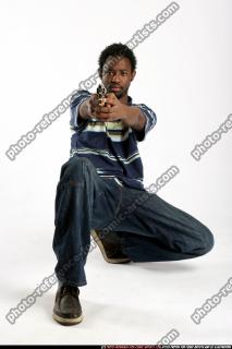 2009 02 GERRY LEANING AIMING PISTOL 00.jpg