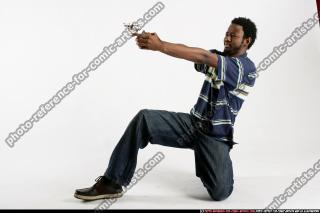 2009 02 GERRY LEANING AIMING PISTOL 08.jpg