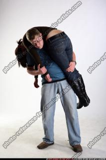 2009 02 MAN CARRYING WOUNDED WOMAN 02.jpg