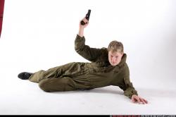 Man Young Average White Martial art Laying poses Army