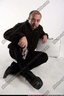 Matej-kneeling-suitcase