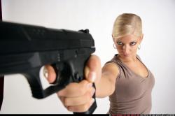 Woman Adult Athletic White Fighting with gun Detailed photos Sportswear