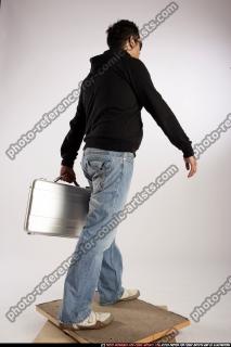 2009 04 JACOB WHITE WALKING BRIEFCASE 03 C.JPG