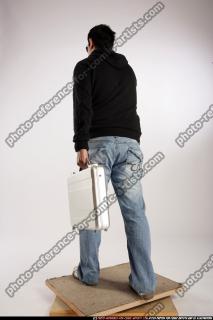 Jacob_White-walking-briefcase