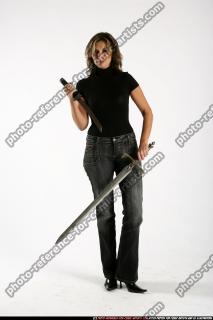 2009 05 WOMAN STANDING DOUBLE KNIVES 01.jpg