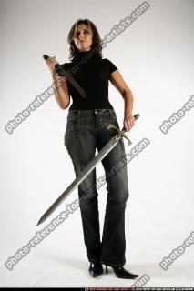 2009 05 WOMAN STANDING DOUBLE KNIVES 02.jpg