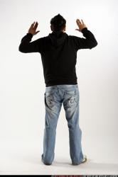 Man Adult Average Black Neutral Standing poses Sportswear