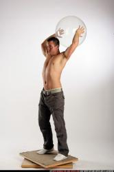 Man Adult Athletic White Throwing Standing poses Pants