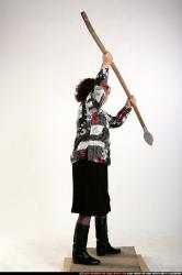 Woman Old Average White Fighting with spear Standing poses Casual