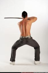 Man Adult Athletic White Fighting with sword Standing poses Pants