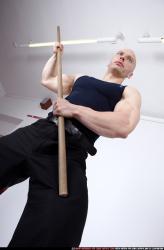 Man Adult Muscular White Martial art Sitting poses Sportswear