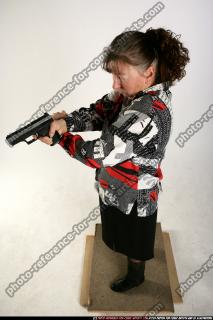 Paula-aiming-pistol-light