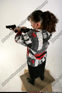 Paula-aiming-pistol-light
