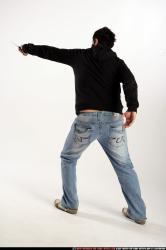 Man Adult Average Black Fighting with knife Standing poses Sportswear