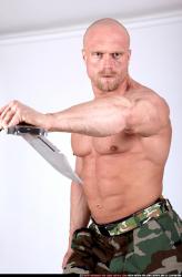 Man Adult Muscular White Fighting with knife Sitting poses Army