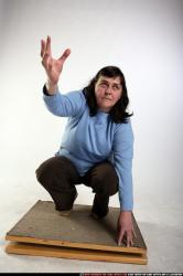Woman Old Chubby White Martial art Kneeling poses Casual