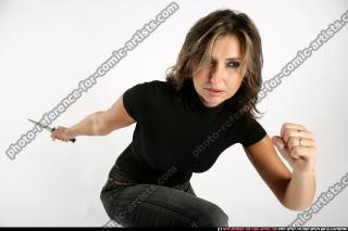 2009 10 WOMAN KNIFE ACTION POSE 13.jpg