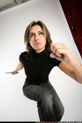 Woman Adult Athletic White Fighting with knife Standing poses Casual