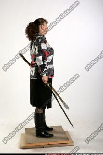 oldwoman-standing-sword-spear
