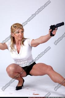 2009 10 JANETTE DUAL PISTOLS POSE1 05.jpg