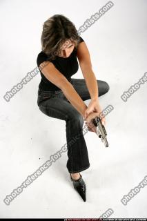 2009 10 WOMAN KNEELING SHOOTING REVOLVER 11.jpg