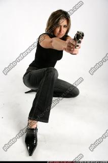 2009 10 WOMAN KNEELING SHOOTING REVOLVER 10.jpg