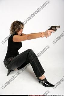 2009 10 WOMAN KNEELING SHOOTING REVOLVER 15.jpg