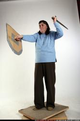 Woman Old Chubby White Fighting with sword Standing poses Casual