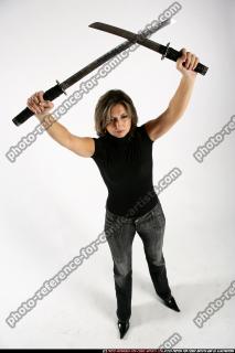 2009 12 WOMAN STANDING SWORDS CROSSING 04.jpg