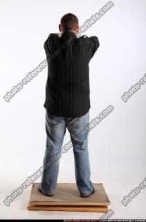 2010 01 DANIEL STANDING DUAL PISTOLS POSE1 04 B