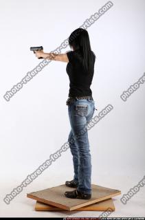 silvia-standing-aiming-pistol