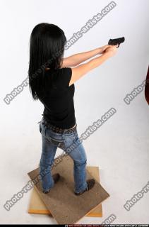 silvia-standing-aiming-pistol