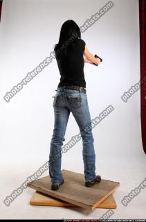 silvia-standing-aiming-pistol