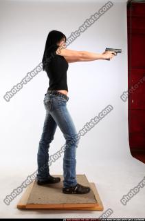 silvia-standing-aiming-pistol