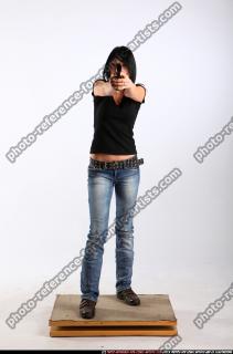 silvia-standing-aiming-pistol