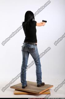silvia-standing-aiming-pistol