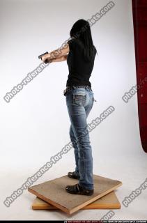 silvia-standing-aiming-pistol
