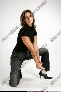 woman-kneeling-revolver
