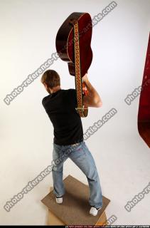 marco-smashing-guitar1