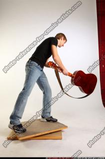 marco-smashing-guitar2